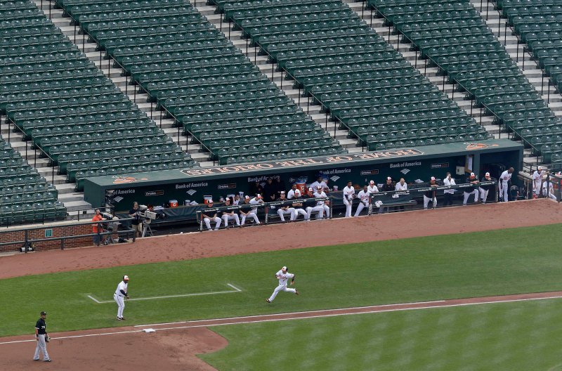 Illustration for article titled Photos: An empty stadium in Baltimore hosts a MLB baseball game